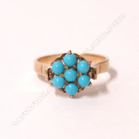 An early 20thC 9ct. yellow gold and turquoise bead ring