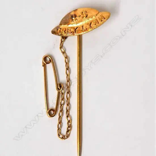 An uncommon gilded 9ct. yellow gold Grey Lynn Returned Services stick pin