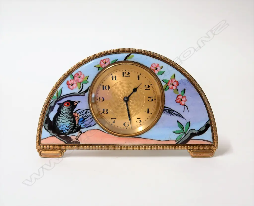 A German Art Deco enamelled and gilded desk clock Image 1++