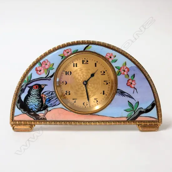 A German Art Deco enamelled and gilded desk clock