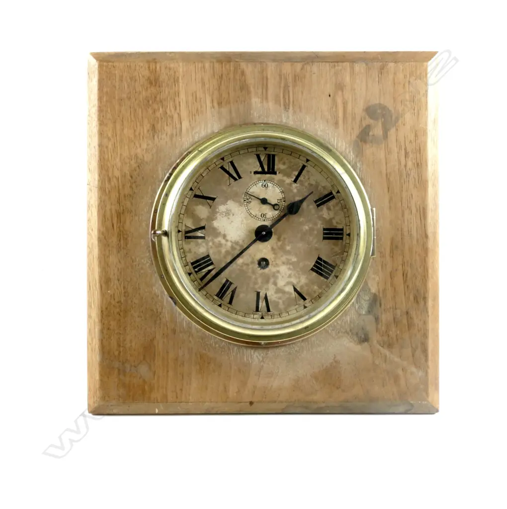 A brass cased ship's clock Image 1++