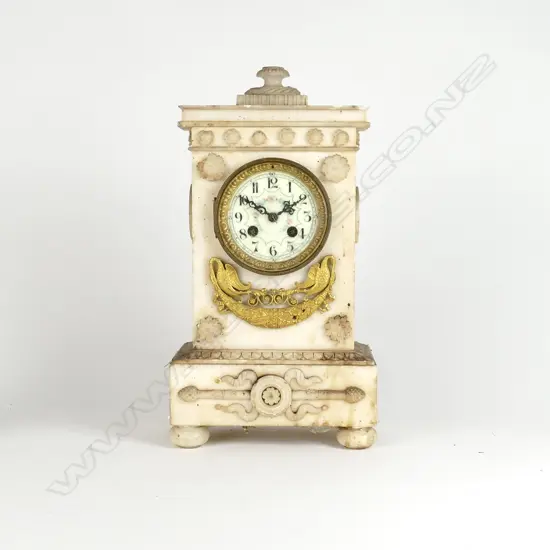 A French alabaster cased mantel clock