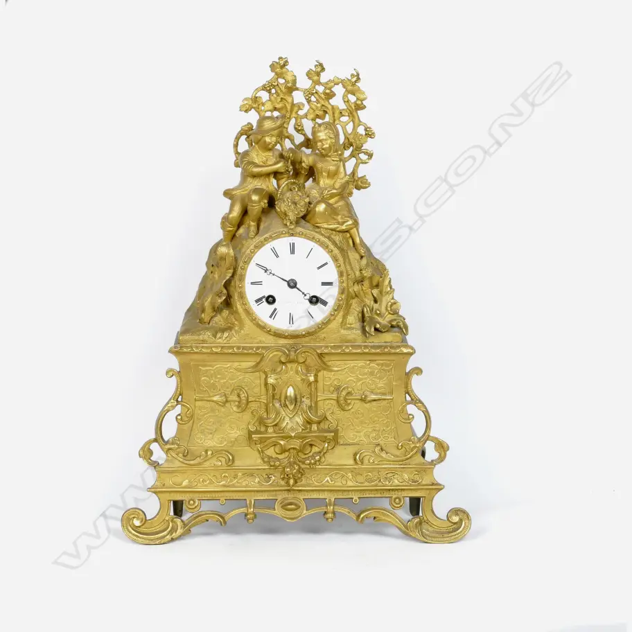 A 19thC French gilt mantel clock Image 1++