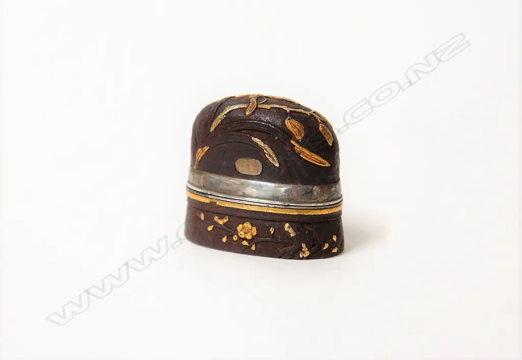 A 19thC or earlier Japanese steel and decorative gold applied sword fitting snuff box Image 1++