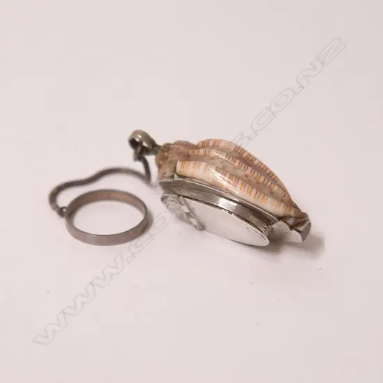 An early 19thC silver and shell vinaigrette