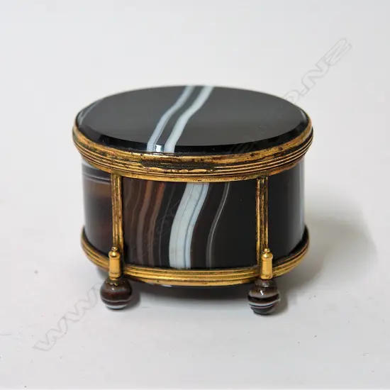 A 19thC banded agate and gilt metal (silver) oval box