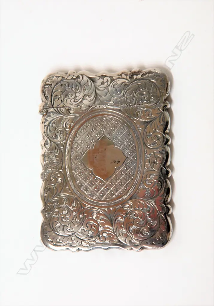 A silver leaf scroll engraved card case Image 1++