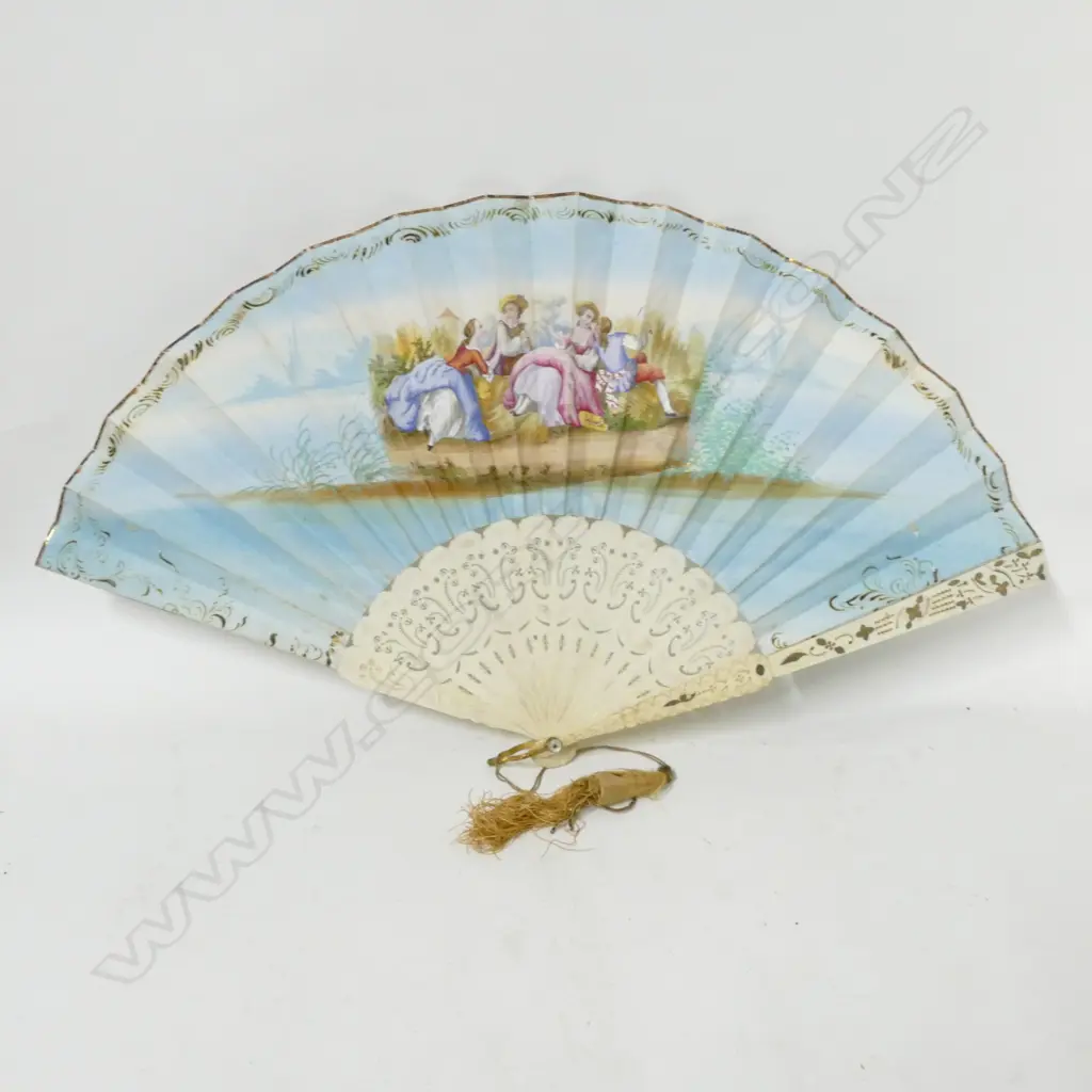 A 19th century bone and pleated paper fan Image 1++