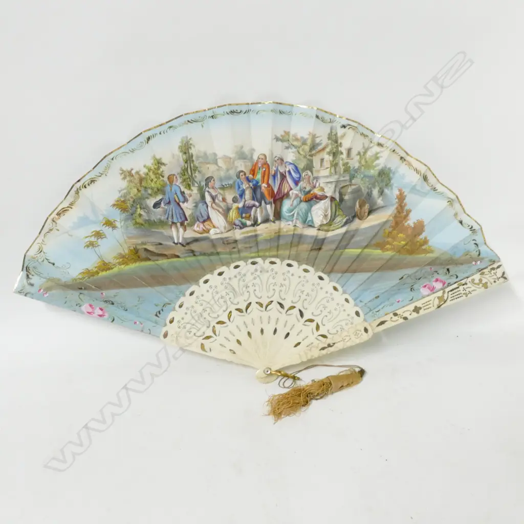 A 19th century bone and pleated paper fan Image 1++