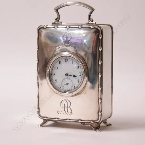 An early 20thC silver cased desk clock