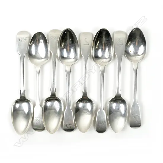 Eight fiddle pattern silver dessert spoons