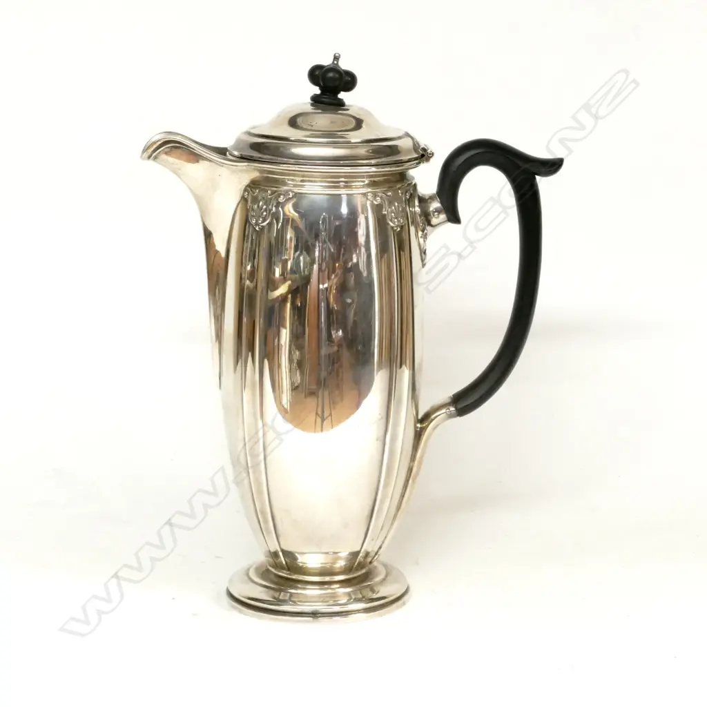 A 1920s silver hot water pot Image 1++