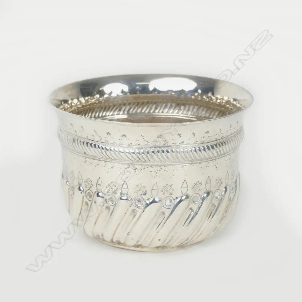 A small Victorian embossed silver basin Image 1++