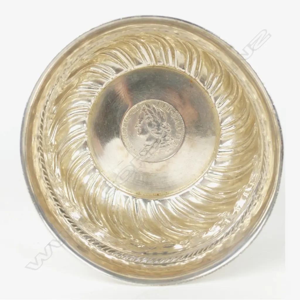 A small Victorian embossed silver basin Image 1++