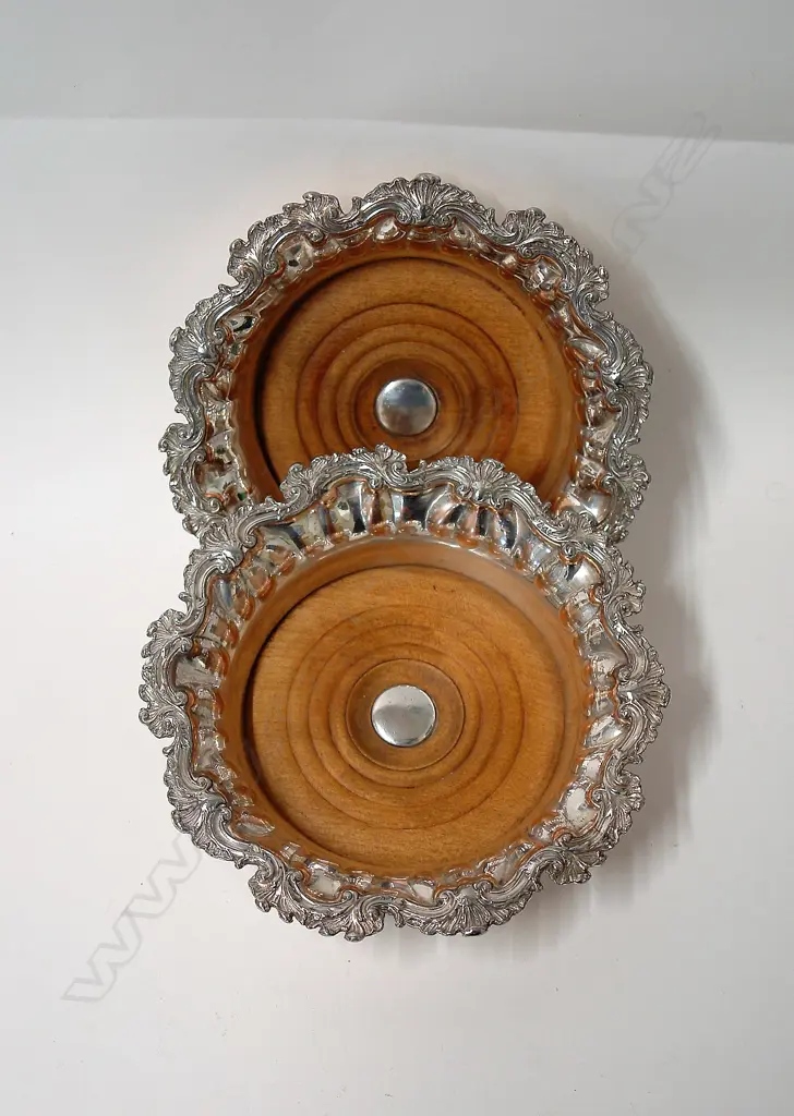 A pair of early Victorian Old Sheffield Plate decorative bottle coasters Image 1++