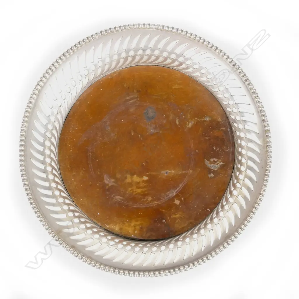 A silver bottle coaster Image 1++