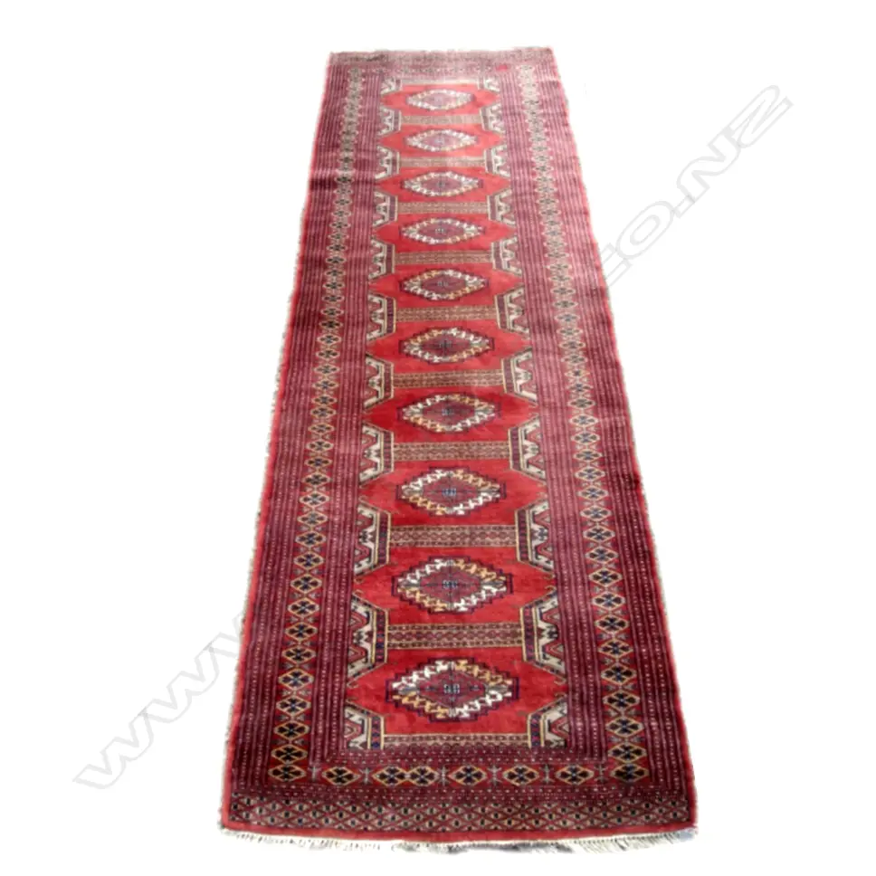 A small hand knotted Bukhara runner Image 1++