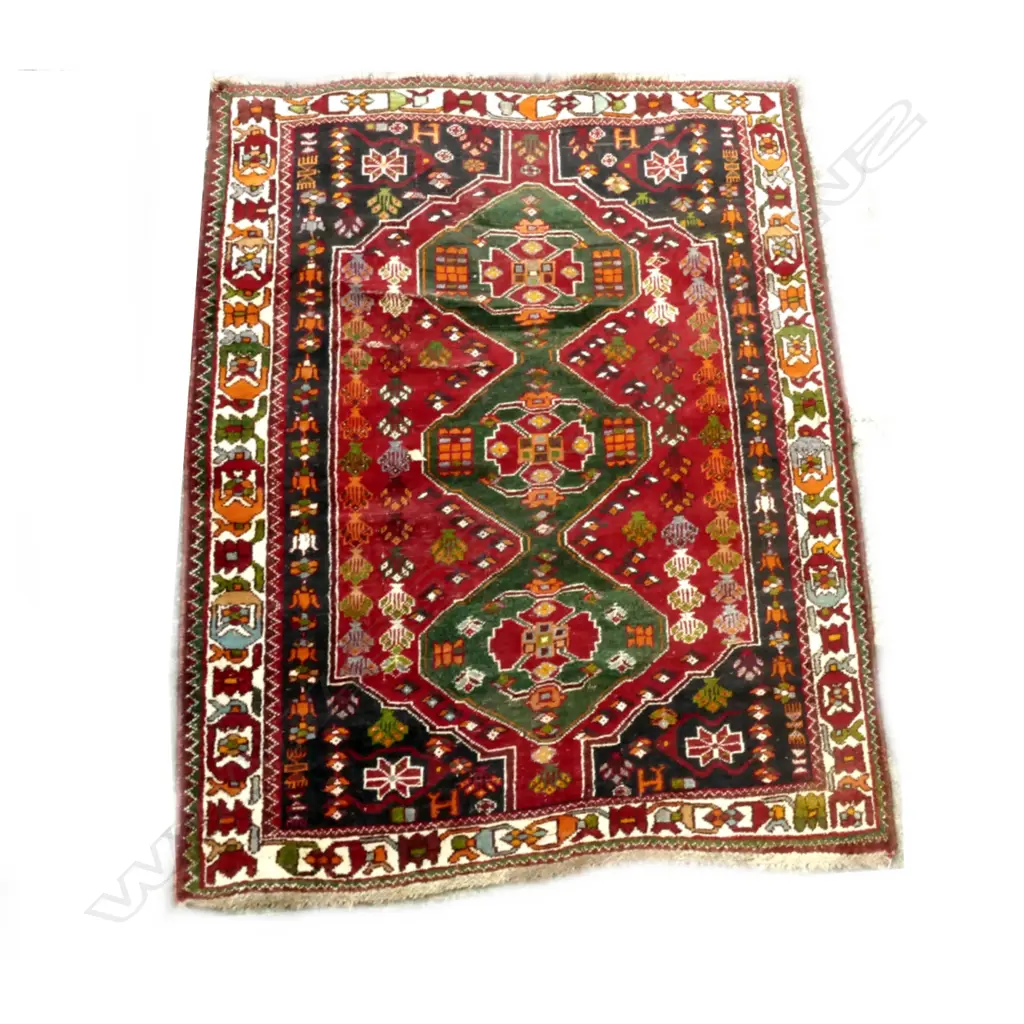 A hand knotted Persian rug Image 1++