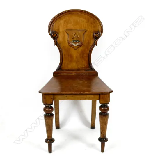 A Victorian oak hall chair