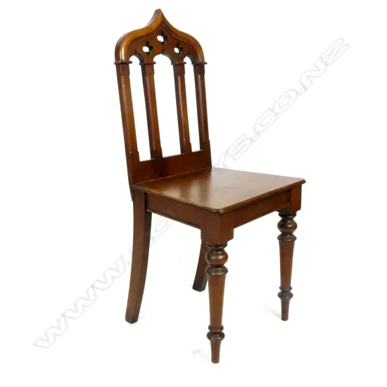 A late Victorian Gothic inspired walnut hall chair