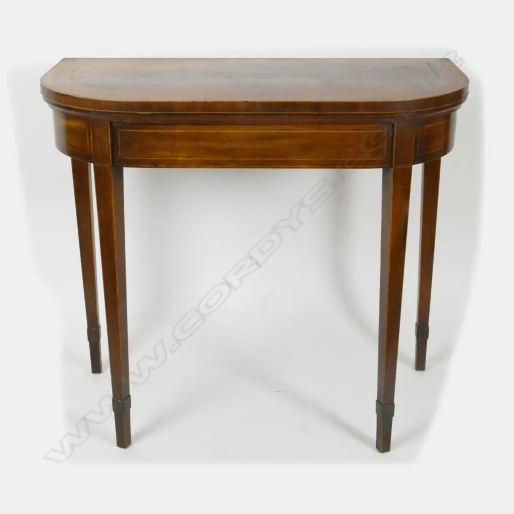 A Georgian double crossbanded flap-top card table Image 1++