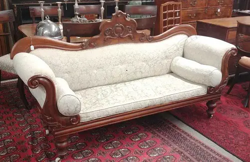 A Victorian mahogany scroll arm settee Image 1++