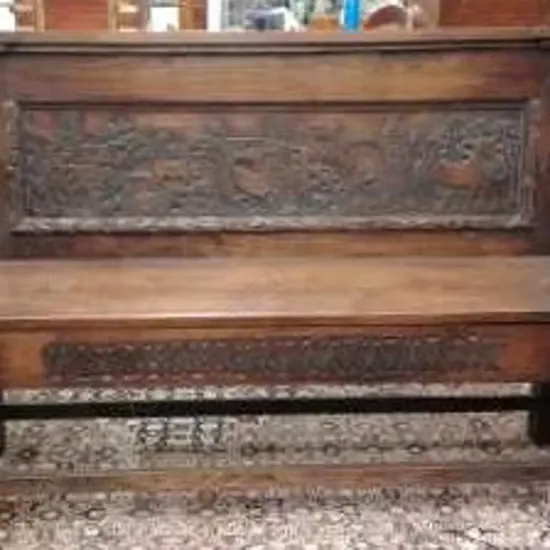 A 1920s oak settle