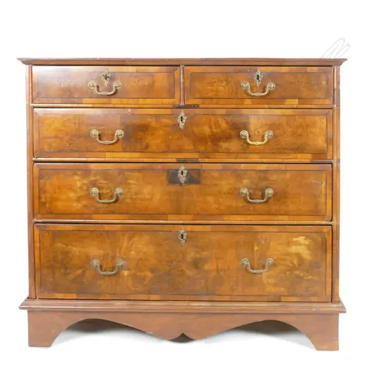 An early 19thC walnut chest of drawers