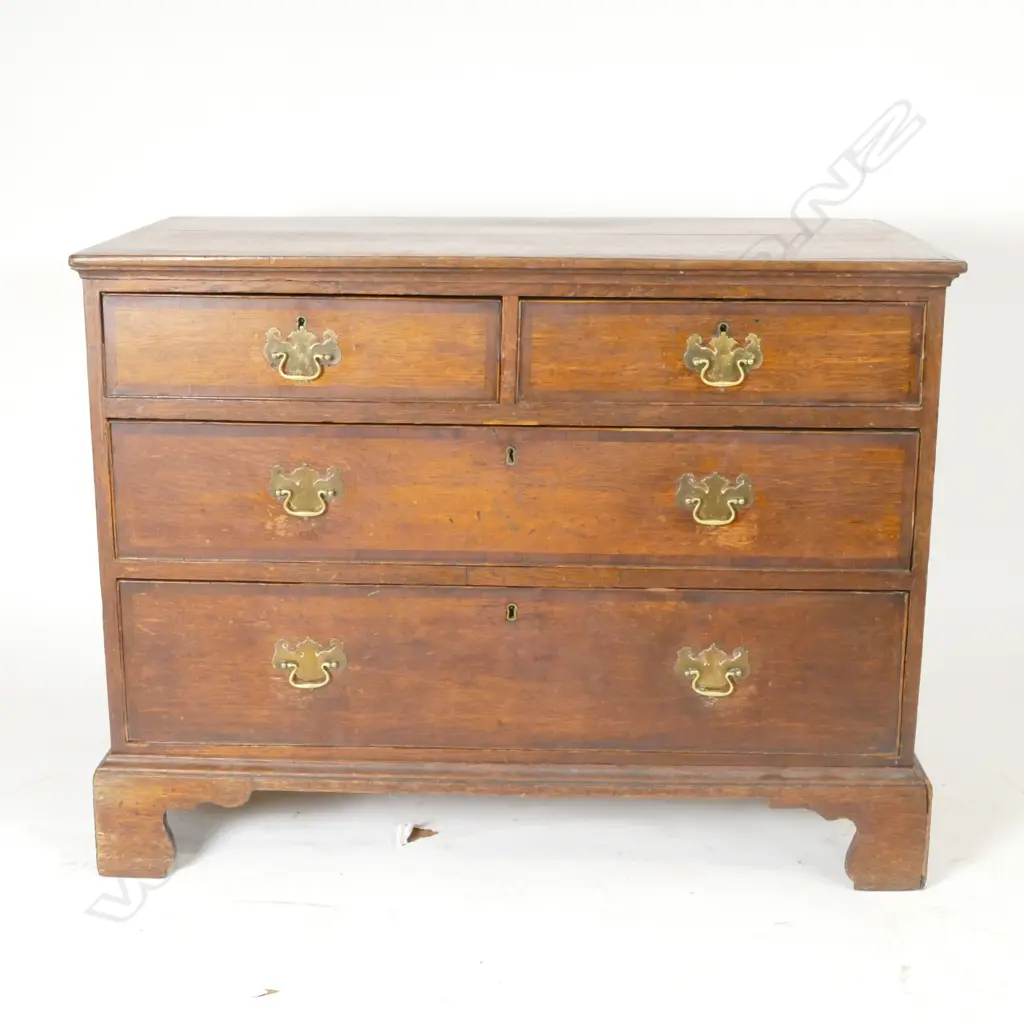 A Georgian flat front chest of four drawers Image 1++