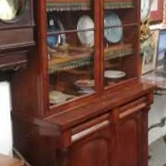 A Victorian mahogany bookcase cabinet