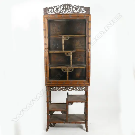 A Chinese teak display cabinet