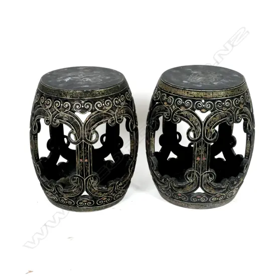 A pair of Chinese black lacquer drum stools