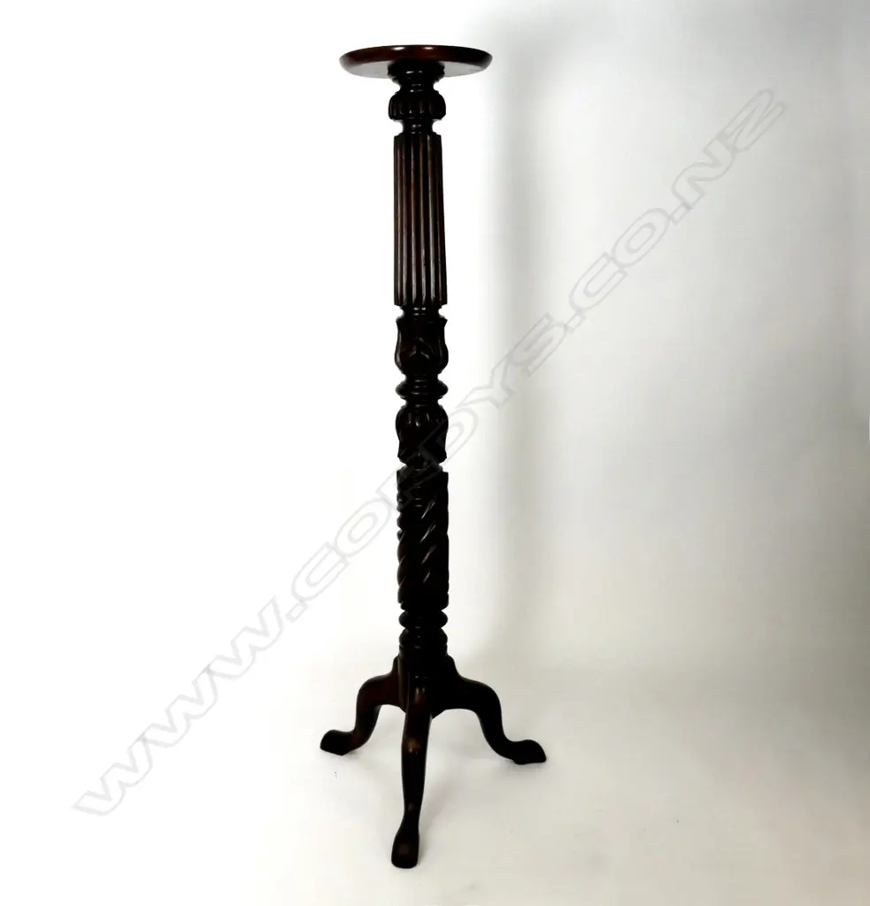 A mahogany torchiere Image 1++
