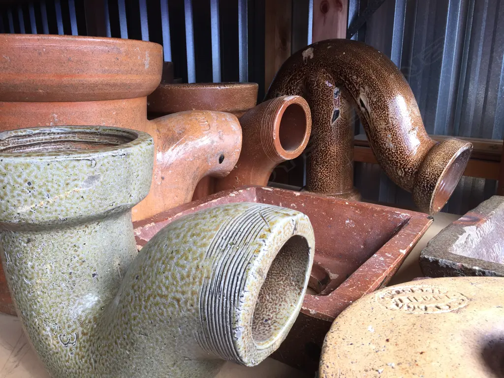 Three various diameter pottery 90° bends Image 1++