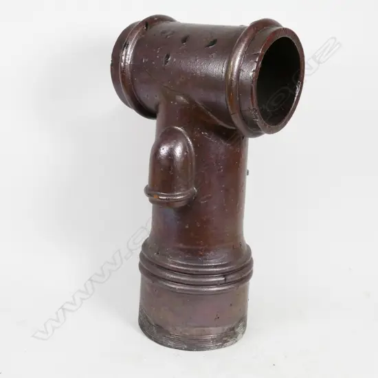 A dark lustrous brown salt glazed chimney pot