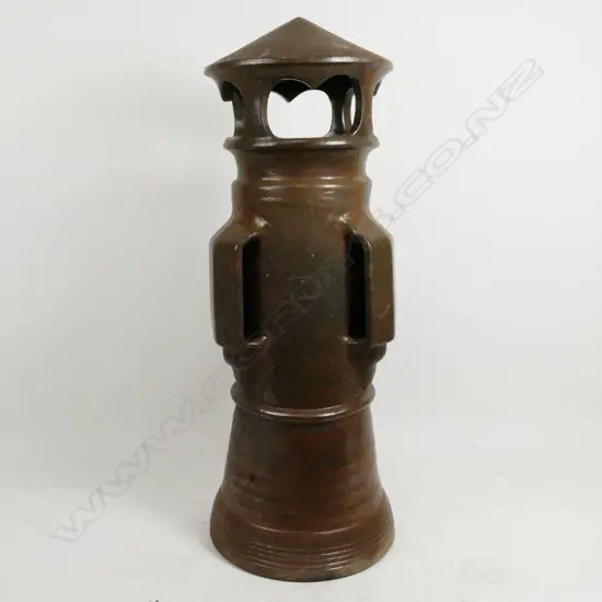 A tall fancy salt glazed chimney by the Amalgamated Brick and Pipe Co. Ltd