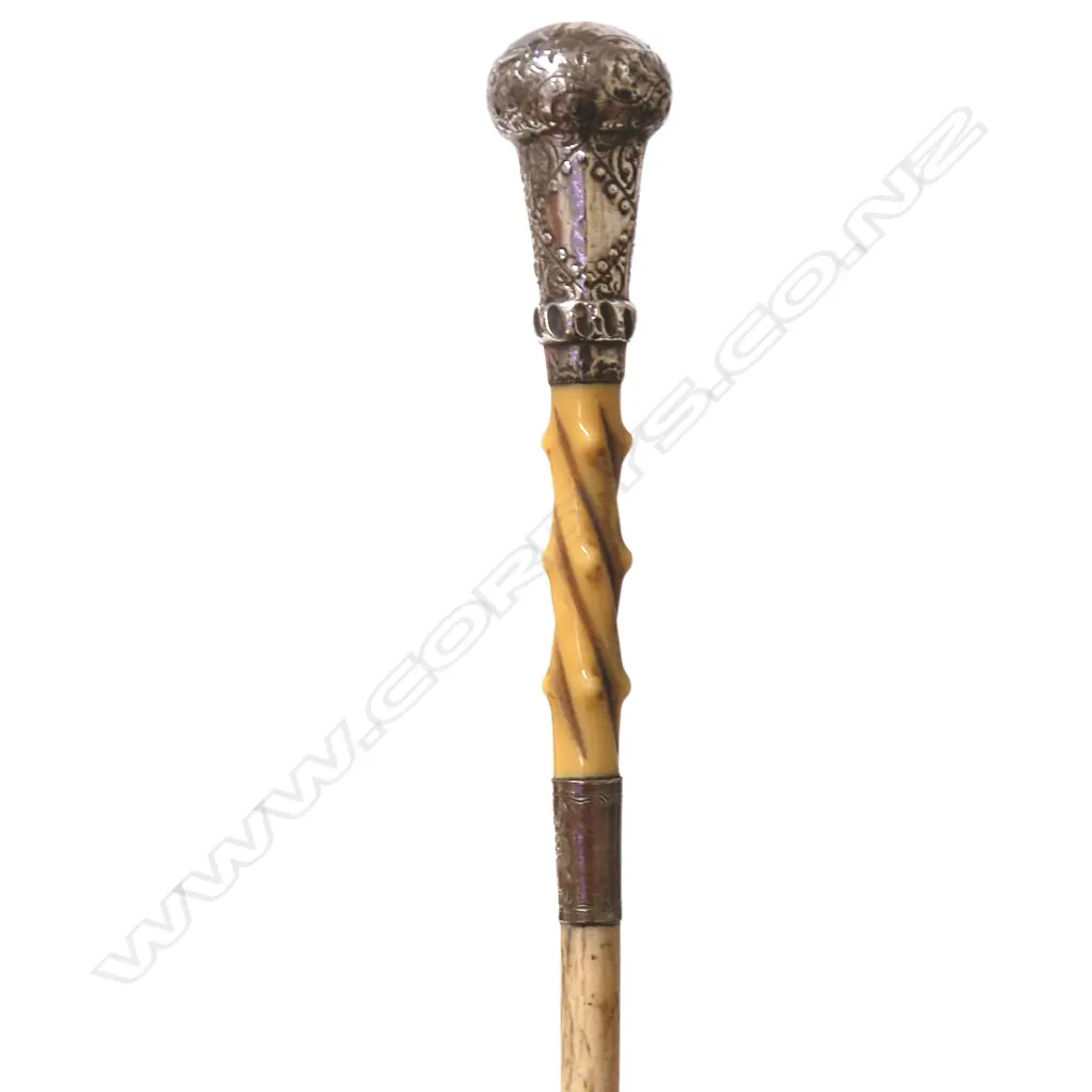 A lady's silver topped whalebone walking cane Image 1++
