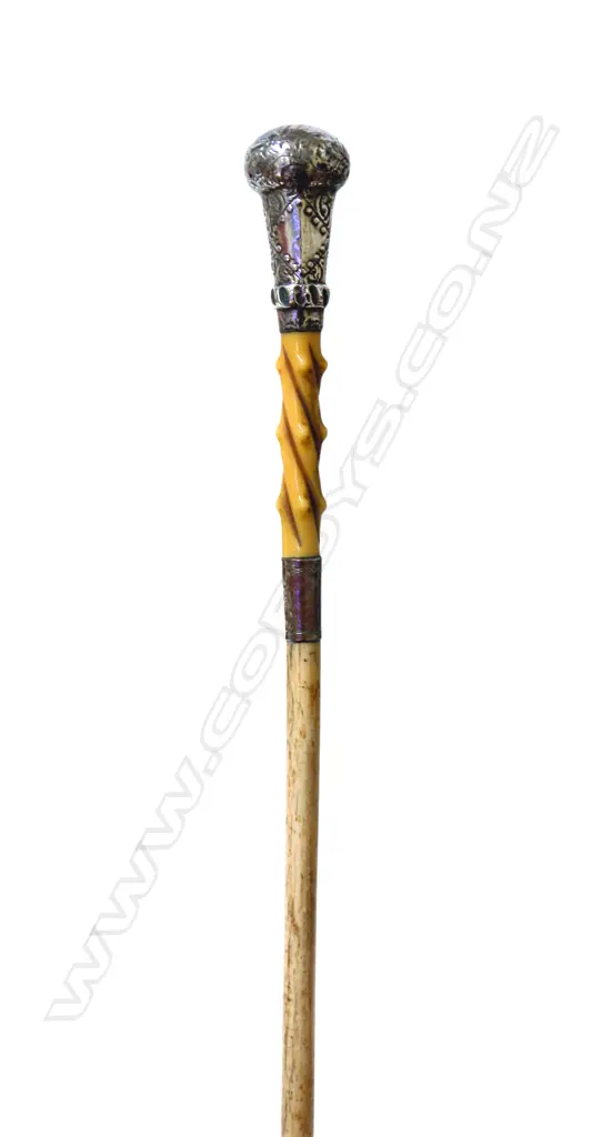 A lady's silver topped whalebone walking cane Image 1++