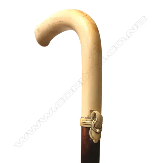 An ivory handled Malacca cane walking stick