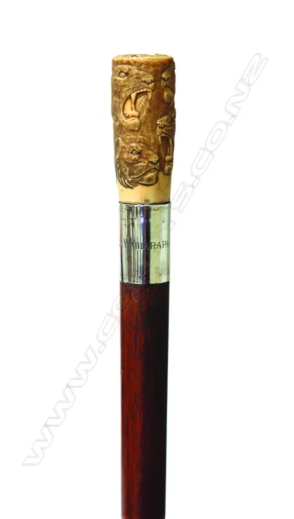 A mahogany and ivory walking stick Image 1++
