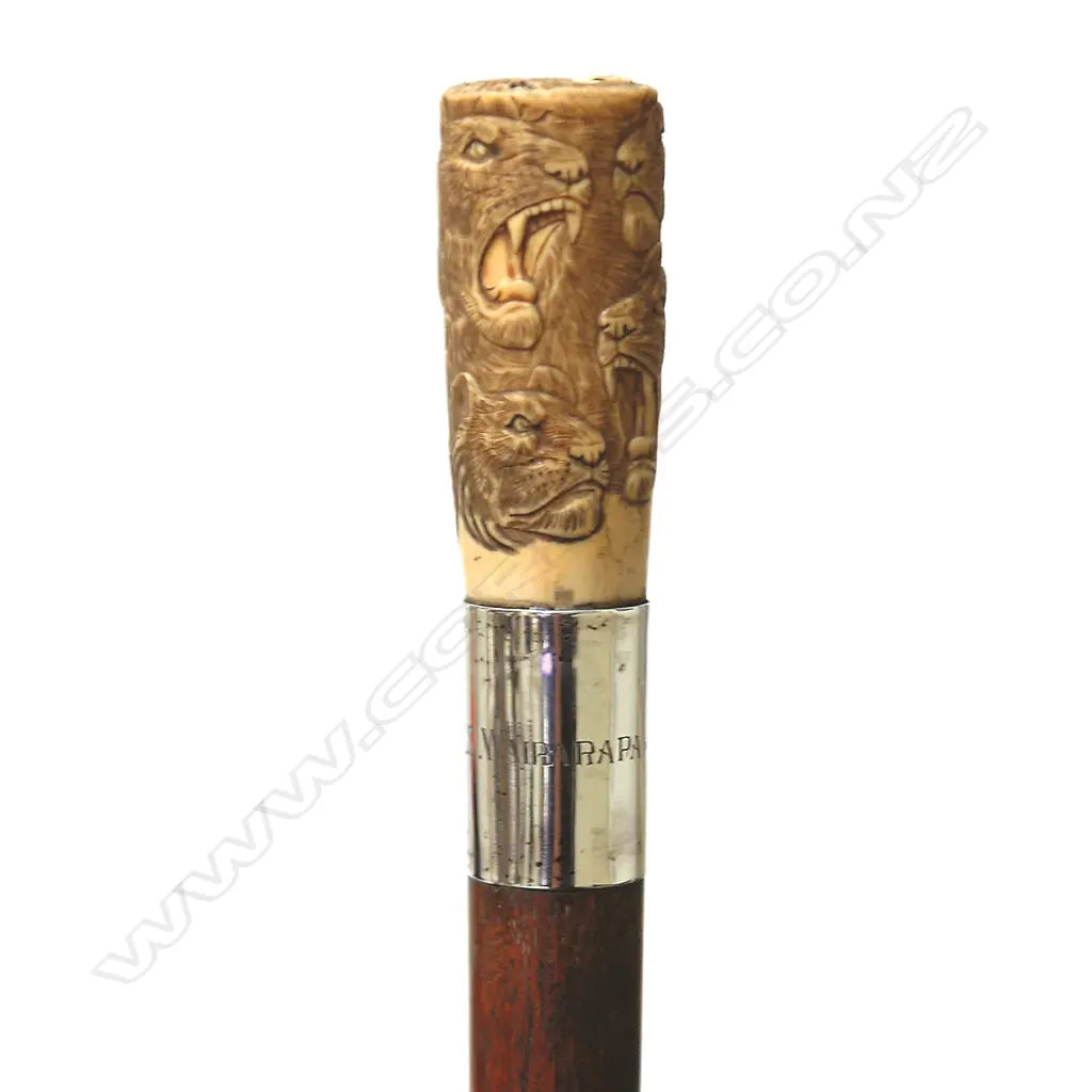 A mahogany and ivory walking stick Image 1++