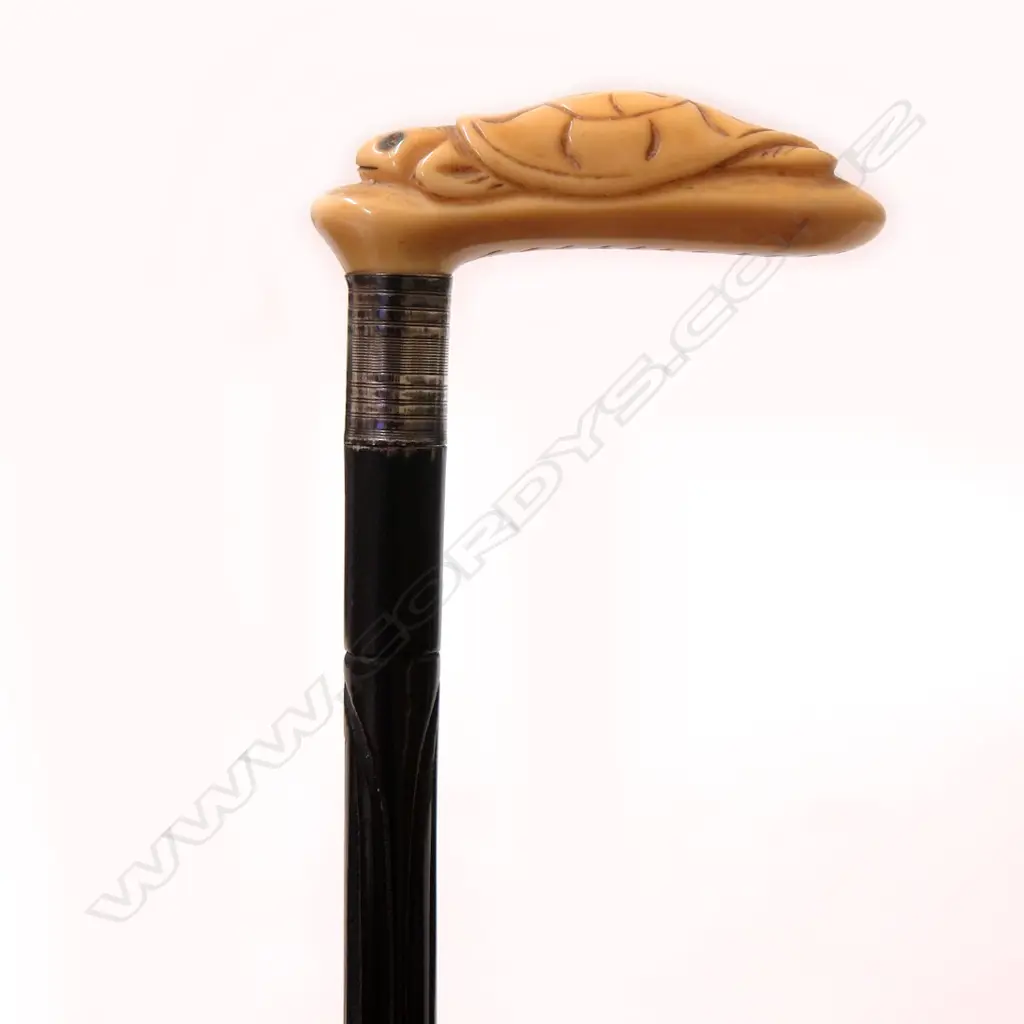 An early Bakelite type short walking stick with ivorine handle Image 1++