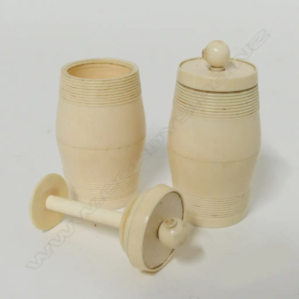 Two 19thC turned ivory barrel shaped bobbin containers Image 1++