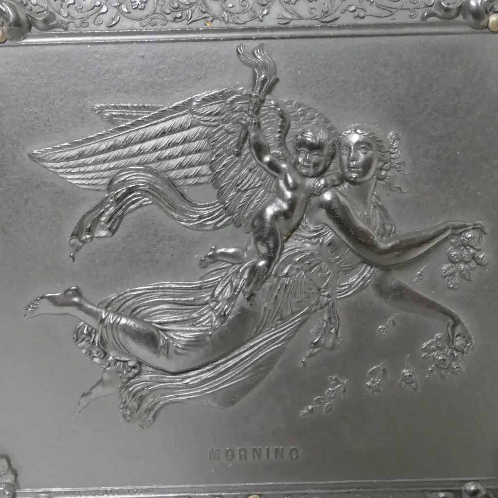 A finely moulded vulcanite box case enclosing two portrait photographs Image 1++