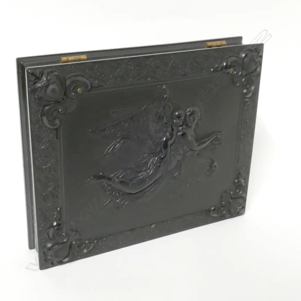 A finely moulded vulcanite box case enclosing two portrait photographs Image 1++