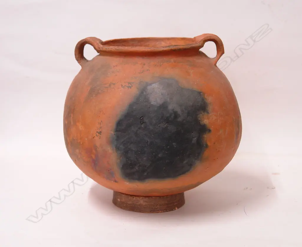 An old terracotta Peruvian spherical vessel Image 1++