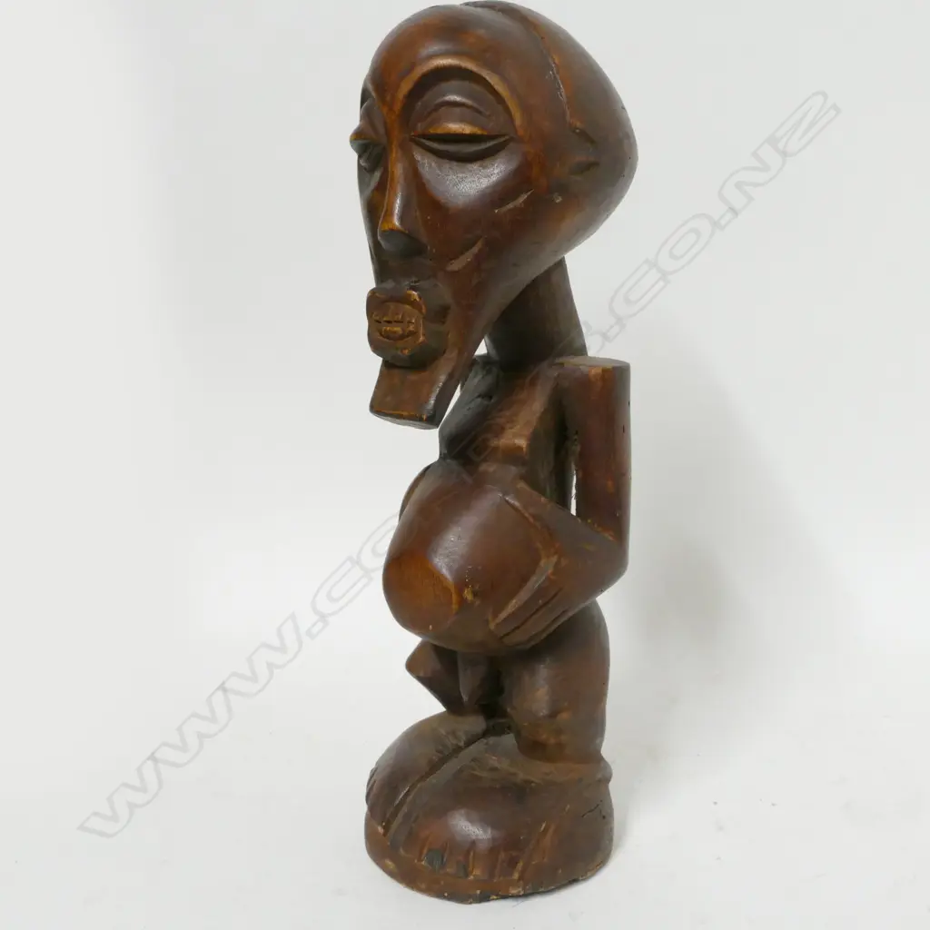 A carved Teke male figure Image 1++