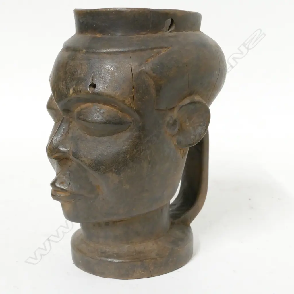A carved Bakuba libation cup Image 1++