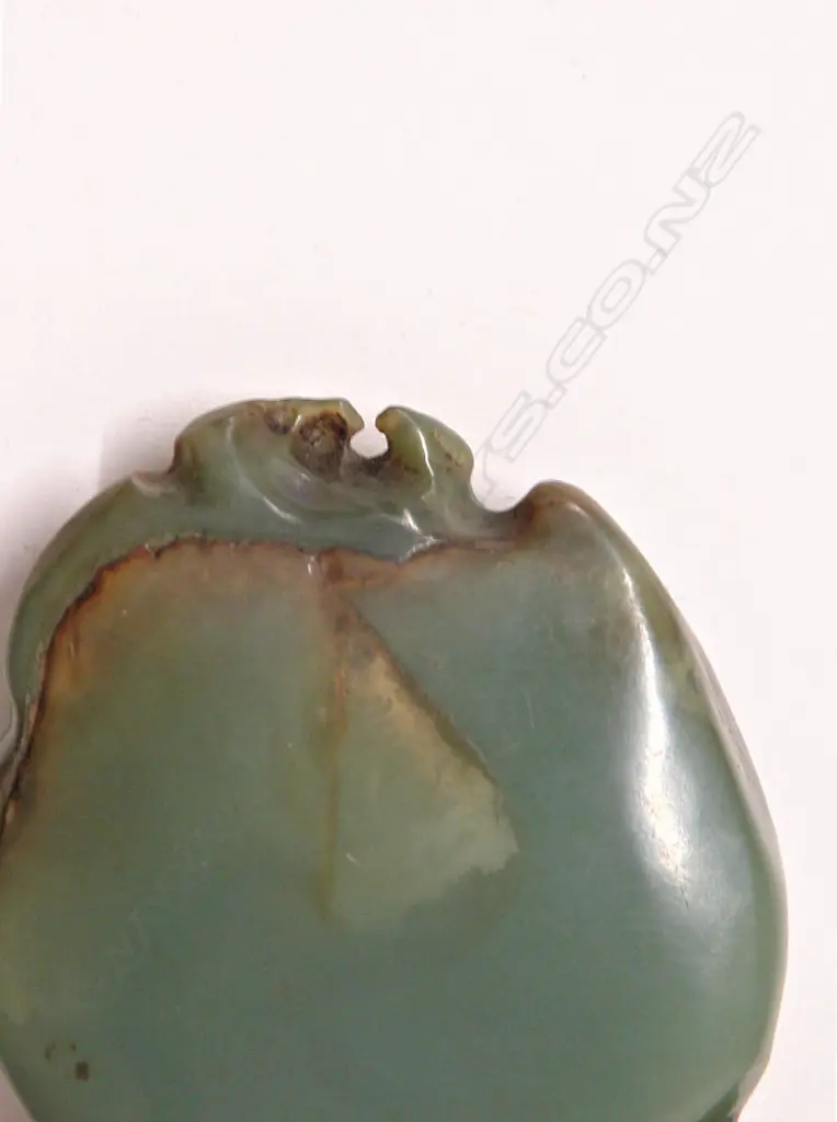 A pre-European Maori pounamu hei tiki Image 1++