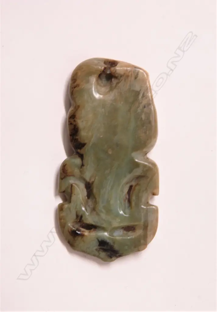 A pre-European Maori carved pounamu hei tiki Image 1++